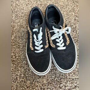 Van’s kid sneakers, fits a woman’s size 8
